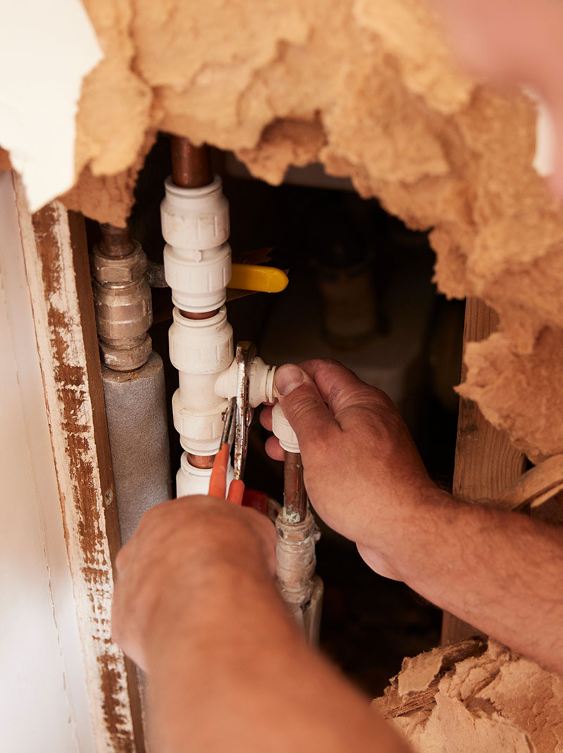 property maintenance includes fixing plumbing such as shown here