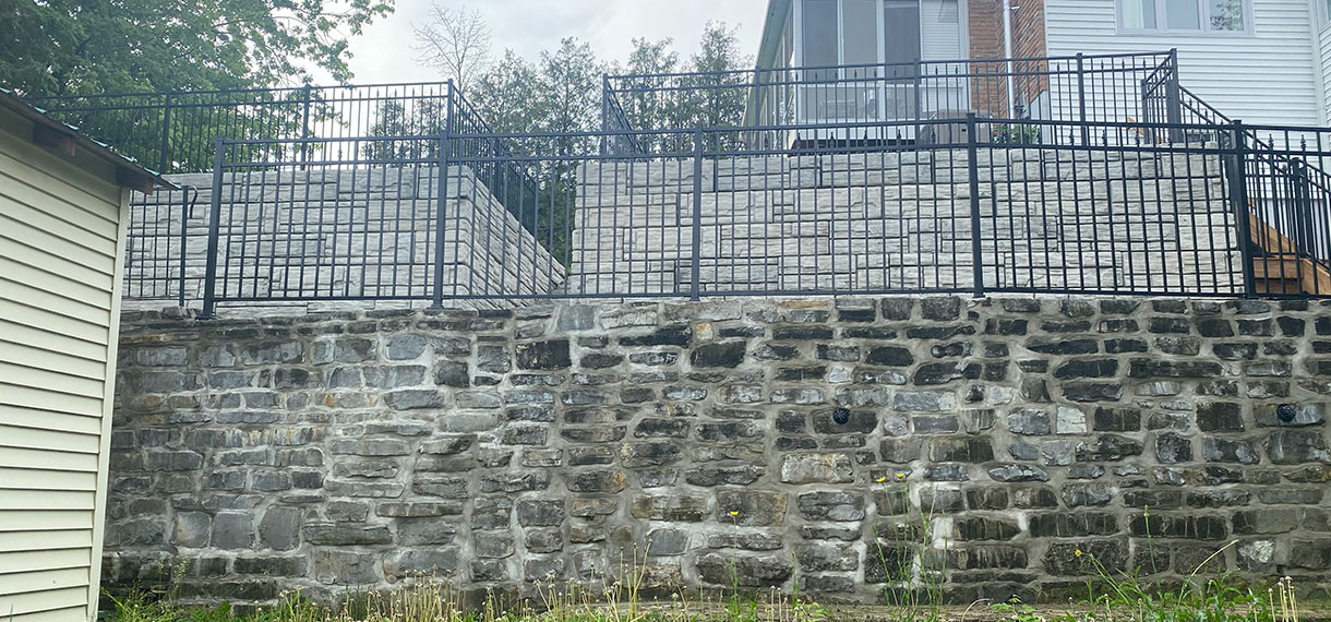 Retaining Wall With Wrought Iron Fence