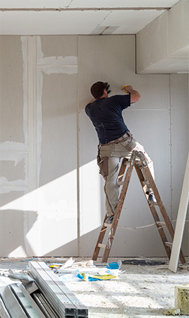general contracting services include renovations such as drywalling, shown here